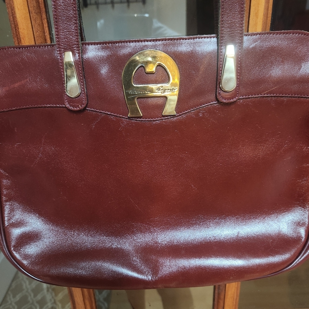 Brown Shoulder Bag with Glossy Finish and Elegant Design